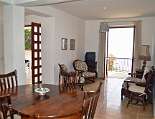 Wohnraum mit Esstisch und Zugang zur Terrasse, Casa Pozzillo I