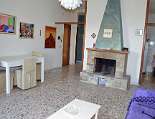 Wohnraum Marina Piccola mit Kamin Wohnraum Marina Piccola mit Kamin